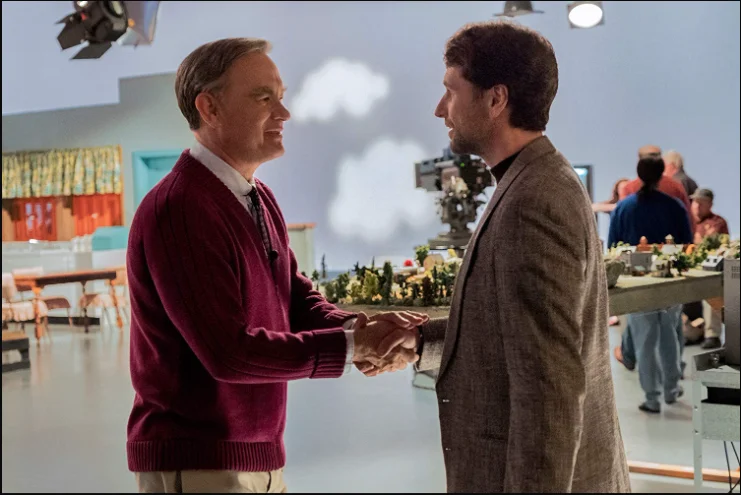Sr. Roger se encontra com o jornalista Lloyd Vogel. Imagem: Cena do filme Um Lindo Dia na Vizinhança.